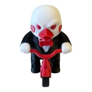 Saw the Duckie Toy Figure on Tricycle